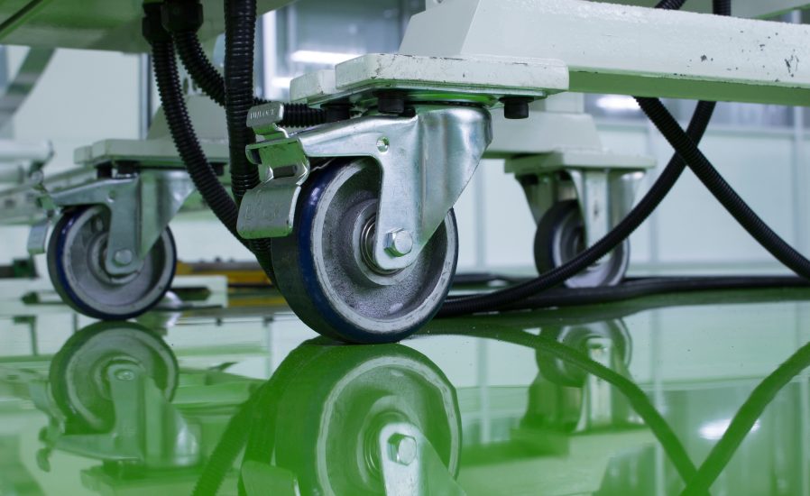A,Cable,Under,Table,Legs,On,Wheels,At,Green,Epoxy