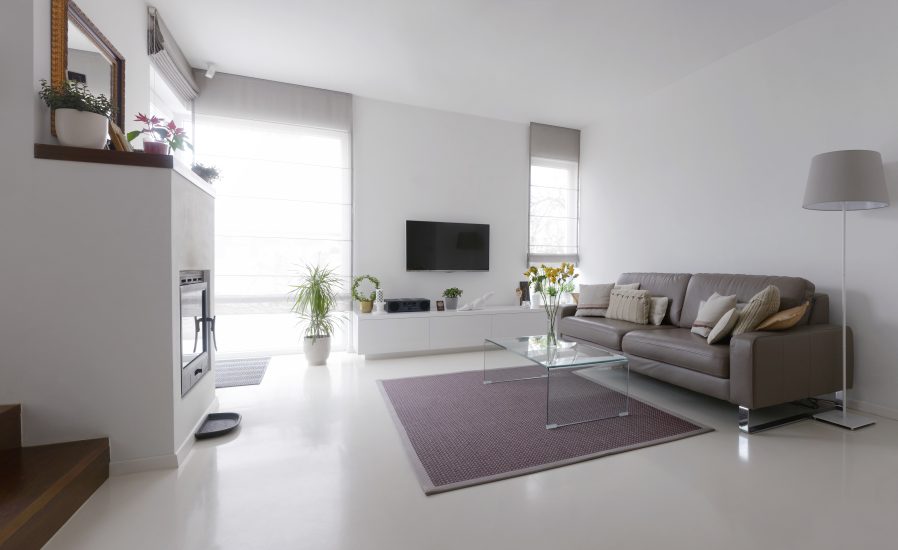 White,Living,Room,With,Taupe,Leather,Sofa,And,Glass,Table